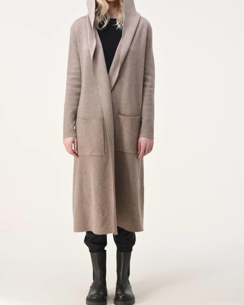 Front of a model wearing a size Large Eva Solid Long Cardigan With Hoodie in Oatmeal in Oatmeal by Essitam. | dia_product_style_image_id:333524